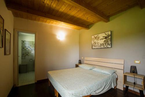 a bedroom with a large bed in a room at Casale Bavi in Ortona