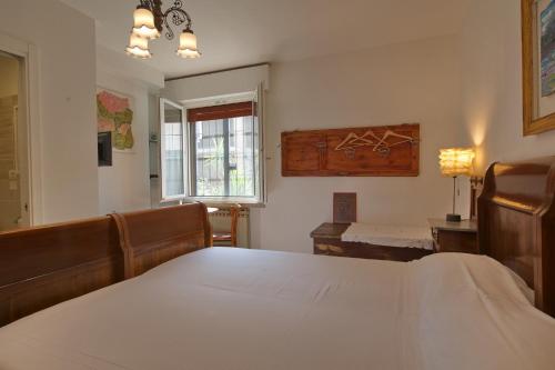 Postel nebo postele na pokoji v ubytování B&B Better Verona