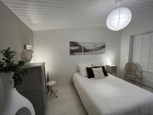 Postel nebo postele na pokoji v ubytování Gîte aux portes d'Angoulême