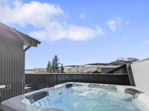 a hot tub on the balcony of a house at 541 Center Circle 3Br 3,5Ba townhouse in Silverthorne