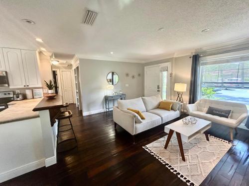 a living room with a couch and a table at Starfish 641 in Sarasota