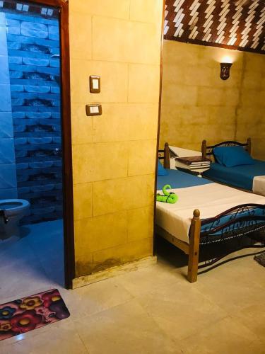 Una cama o camas en una habitación de Labib Guest House