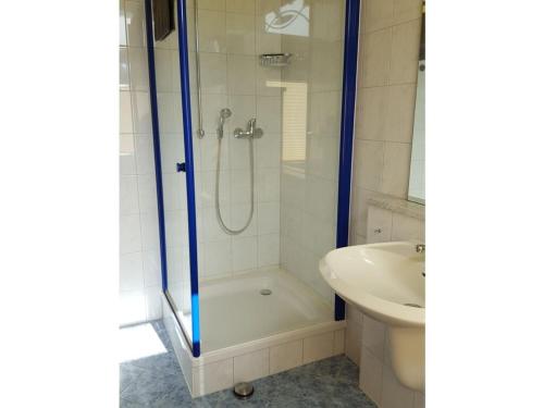 a bathroom with a shower and a sink at Holiday apartment in Waren Müritz in Waren