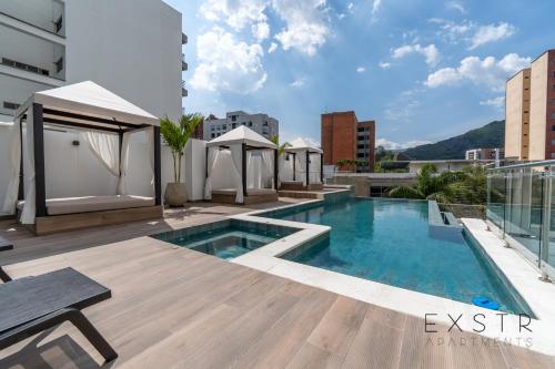 a swimming pool on the roof of a building at Riomaggiore City Tower in Cali