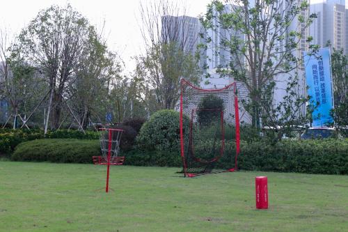 a playground in a park with a net at Crowne Plaza Suzhou East Taihu by IHG in Suzhou