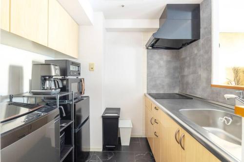 Η κουζίνα ή μικρή κουζίνα στο Cozy Stay Sapporo Central 1302