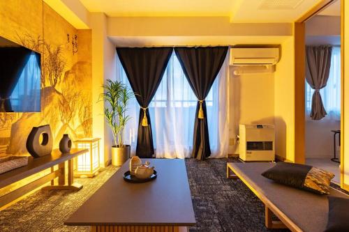 Μια τηλεόραση ή/και κέντρο ψυχαγωγίας στο Cozy Stay Sapporo Central 1302
