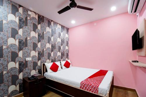 Postel nebo postele na pokoji v ubytování Hotel O Jai Jagannath Inn