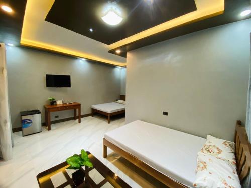 Ένα ή περισσότερα κρεβάτια σε δωμάτιο στο Dos Casa Guest House