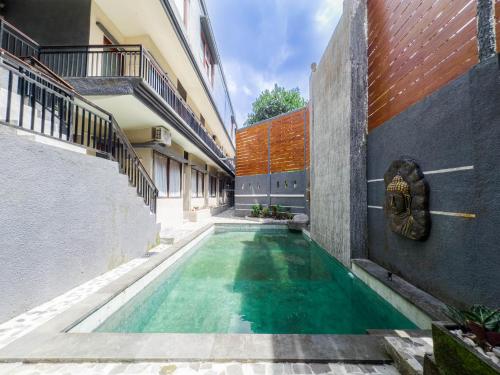 Bazén v ubytování Giriya Amerta Hotel nebo v jeho okolí