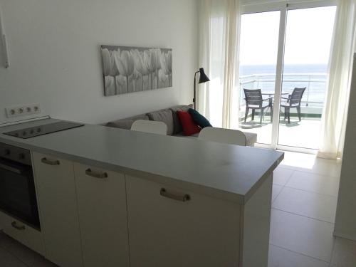 Η κουζίνα ή μικρή κουζίνα στο Atico en Salinetas