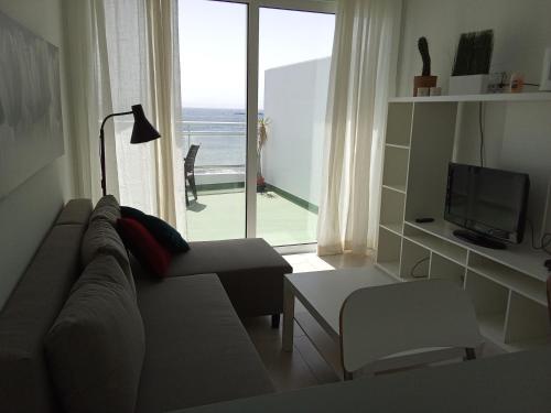 Μια τηλεόραση ή/και κέντρο ψυχαγωγίας στο Atico en Salinetas