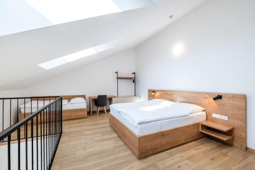 Postel nebo postele na pokoji v ubytování Apartmány Lošov