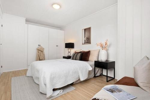 Postel nebo postele na pokoji v ubytování Behagliche 5 Sterne FeWo, See, Sauna, Hund