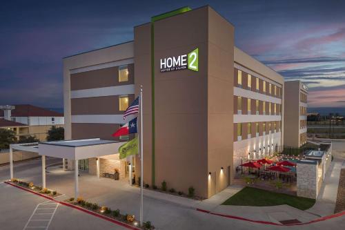 a hotel building with a home sign on it at Home2 Suites By Hilton Laredo North in Laredo