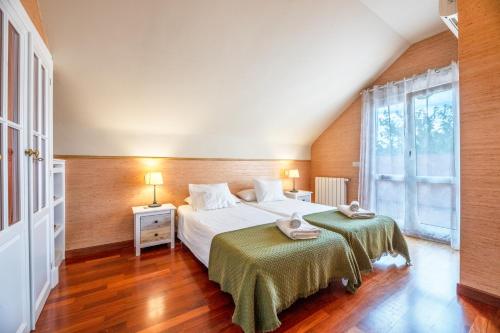 A bed or beds in a room at Benalmádena Coast Villa