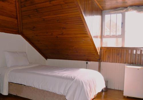 Postel nebo postele na pokoji v ubytování HOME AWAY FROM HOME