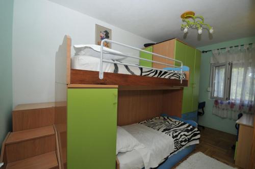 Posteľ alebo postele v izbe v ubytovaní Apartments Ivica