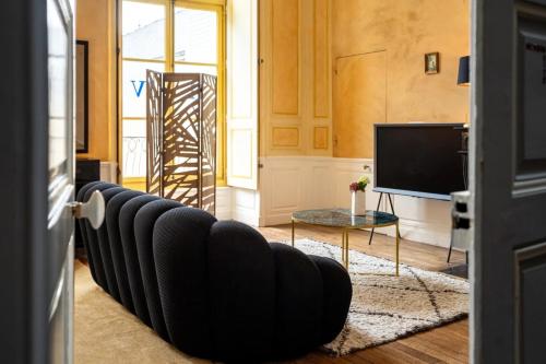 Le Henri II - logements d'exceptions entièrement autonomesにあるテレビまたはエンターテインメントセンター