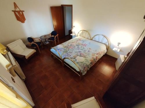 Postel nebo postele na pokoji v ubytování Rasna Heart Guest House