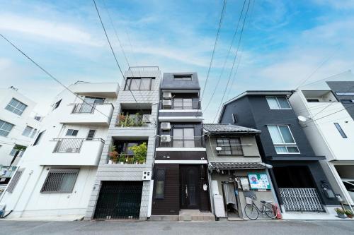 ちよ 桜と過ごすお部屋 usjまで電車で10分 4つの寝室 お風呂2台 トイレ4台