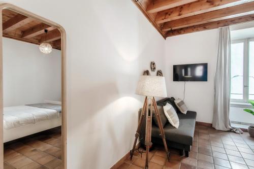 Postel nebo postele na pokoji v ubytování Pardo Apartments by Quokka 360 - Locarno old town