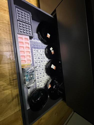 a vending machine filled with bottles of wine at TULUM luxury suites-SKOPJE in Skopje