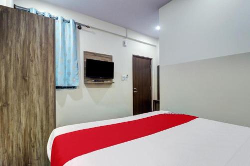 Ένα ή περισσότερα κρεβάτια σε δωμάτιο στο Hotel SKY INNs