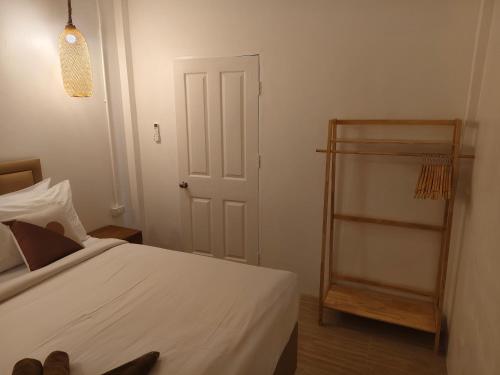 En eller flere senger på et rom på Seaview Home Samet