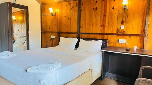 Postel nebo postele na pokoji v ubytování Sameer beachfront Cottages