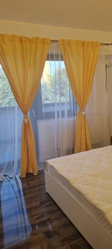 Ένα ή περισσότερα κρεβάτια σε δωμάτιο στο Apartament Parc Romanesc