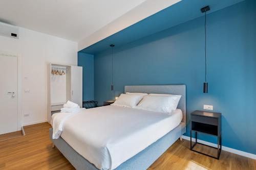 Postel nebo postele na pokoji v ubytování Relais Garbatella