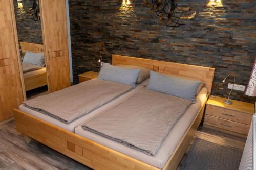 Haus Alpin Apartmentsにあるベッド