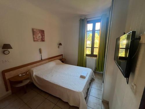 Postel nebo postele na pokoji v ubytování Appartement 2 chambres pour 6 personnes en résidence à la nuitée