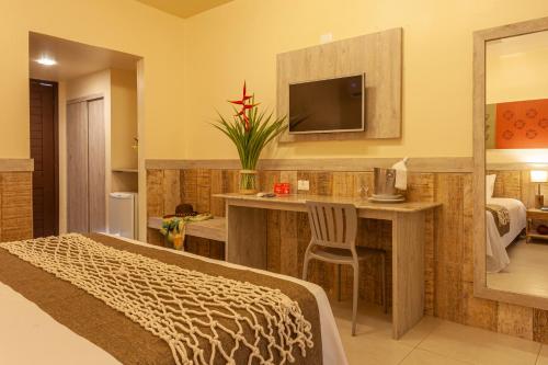 Ocaporã Hotel All Inclusiveにあるベッド