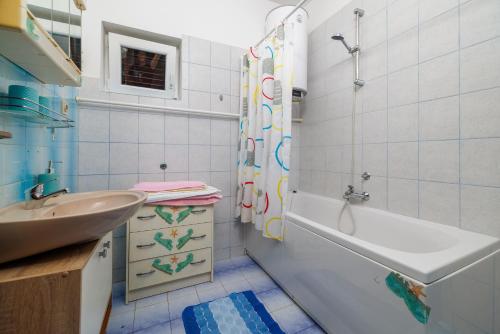 Kúpeľňa v ubytovaní Apartments Zvonimir