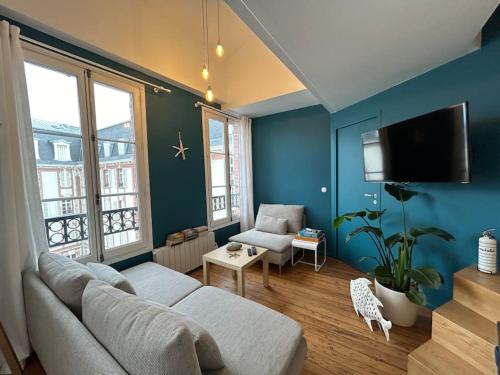 TV a/nebo společenská místnost v ubytování Le Duplex, parking & Accès Plage !