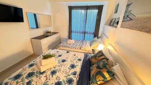 Un ou plusieurs lits dans un hébergement de l'établissement Boca Chica Luxury apartment