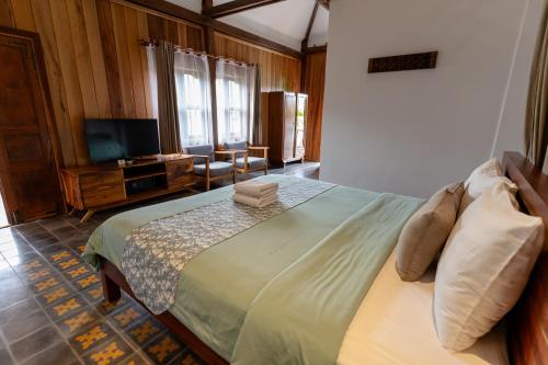 Villa Isannにあるベッド