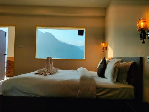 Postel nebo postele na pokoji v ubytování SVS Recreational Hotels & Resorts