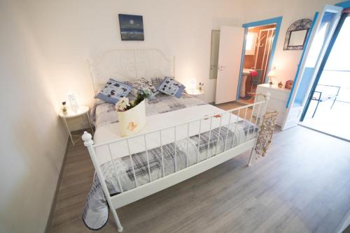 Postel nebo postele na pokoji v ubytování Appartamento Onda Luxury - MyHo Casa