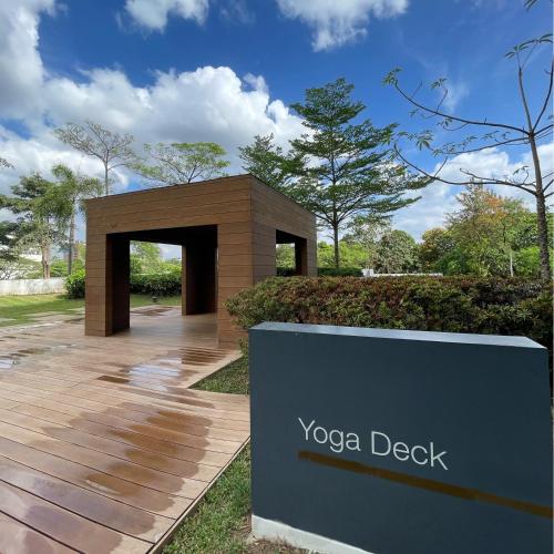 a sign for a yoga deck in a park at 1 Bedroom Penthouse 3BEDS Sunset & City lights with big balcony FREE ACCESS to all amenities in Manila