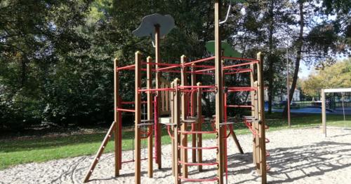 a park with a playground with a play equipment at Xiu's home in Wielsbeke
