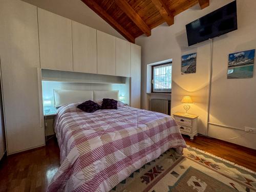 Postel nebo postele na pokoji v ubytování B&B La Grivola