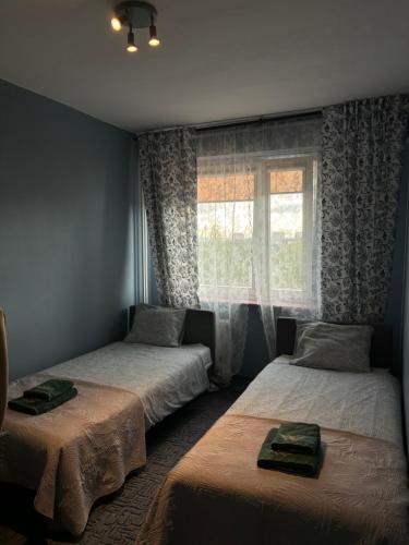 Postel nebo postele na pokoji v ubytování pokoje do wynajęcia - Podwisłocze 24