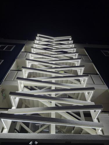 a row of white stairs in a building at AH Hotel in Antofagasta