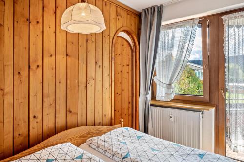 Ένα ή περισσότερα κρεβάτια σε δωμάτιο στο Bärenhüsli