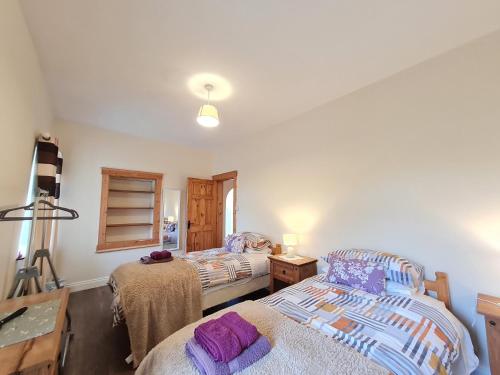 Cama o camas de una habitación en Cushatrough Claddaghduff