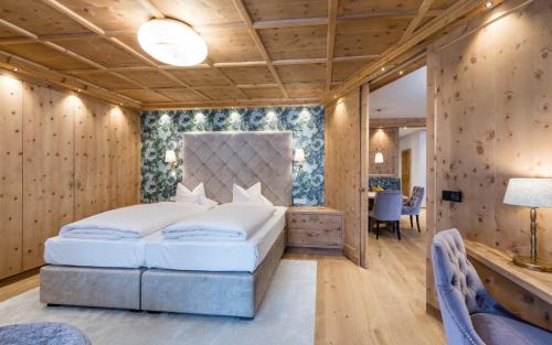 Posteľ alebo postele v izbe v ubytovaní Wohlfühlresort Peternhof