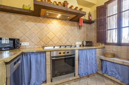 Η κουζίνα ή μικρή κουζίνα στο Villa Can Salat
